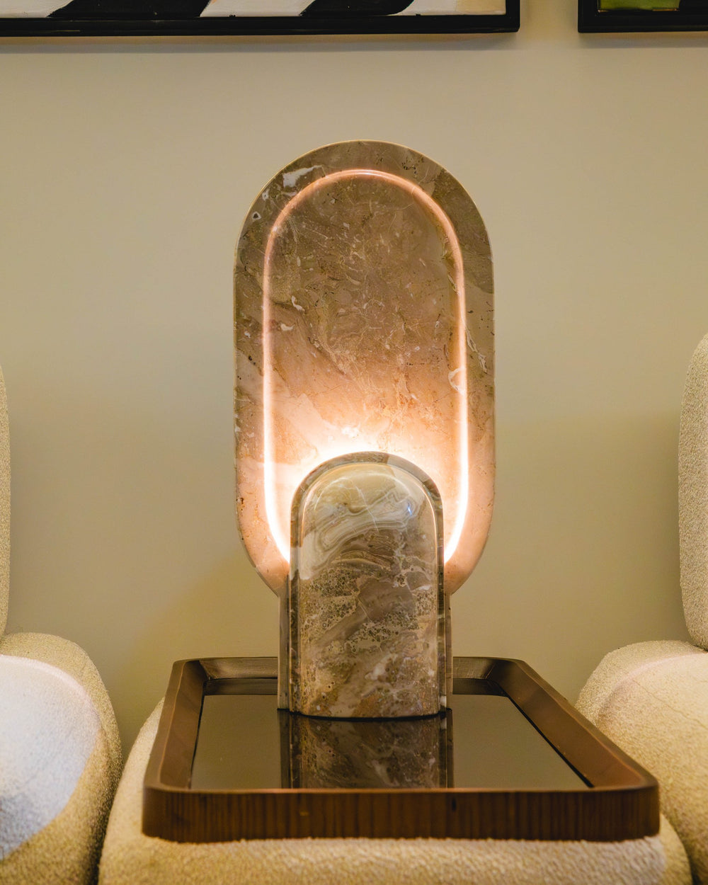 04-room | AKHET Table Lamp — lit on a tray between two armchairs