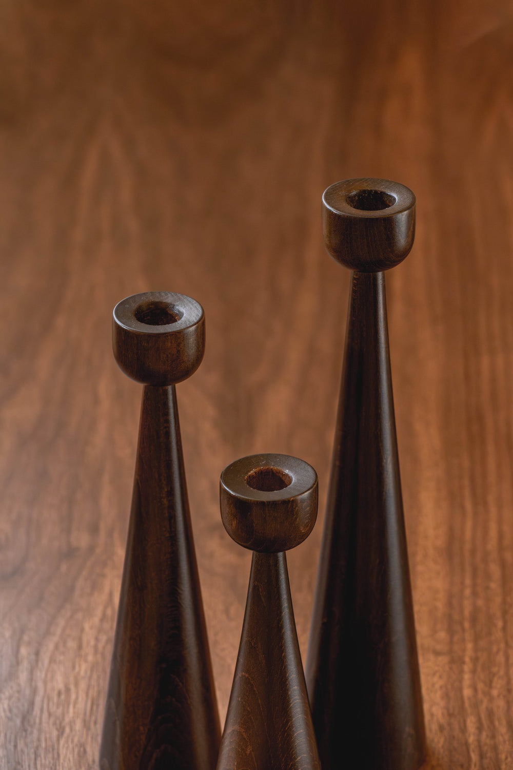 03-real | SOLNE Candle Holder — the three heights on walnut