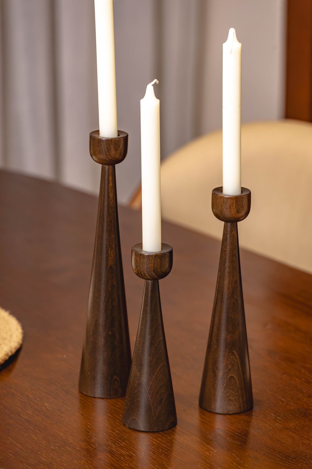 04-room | SOLNE Candle Holder — lit on a dining table