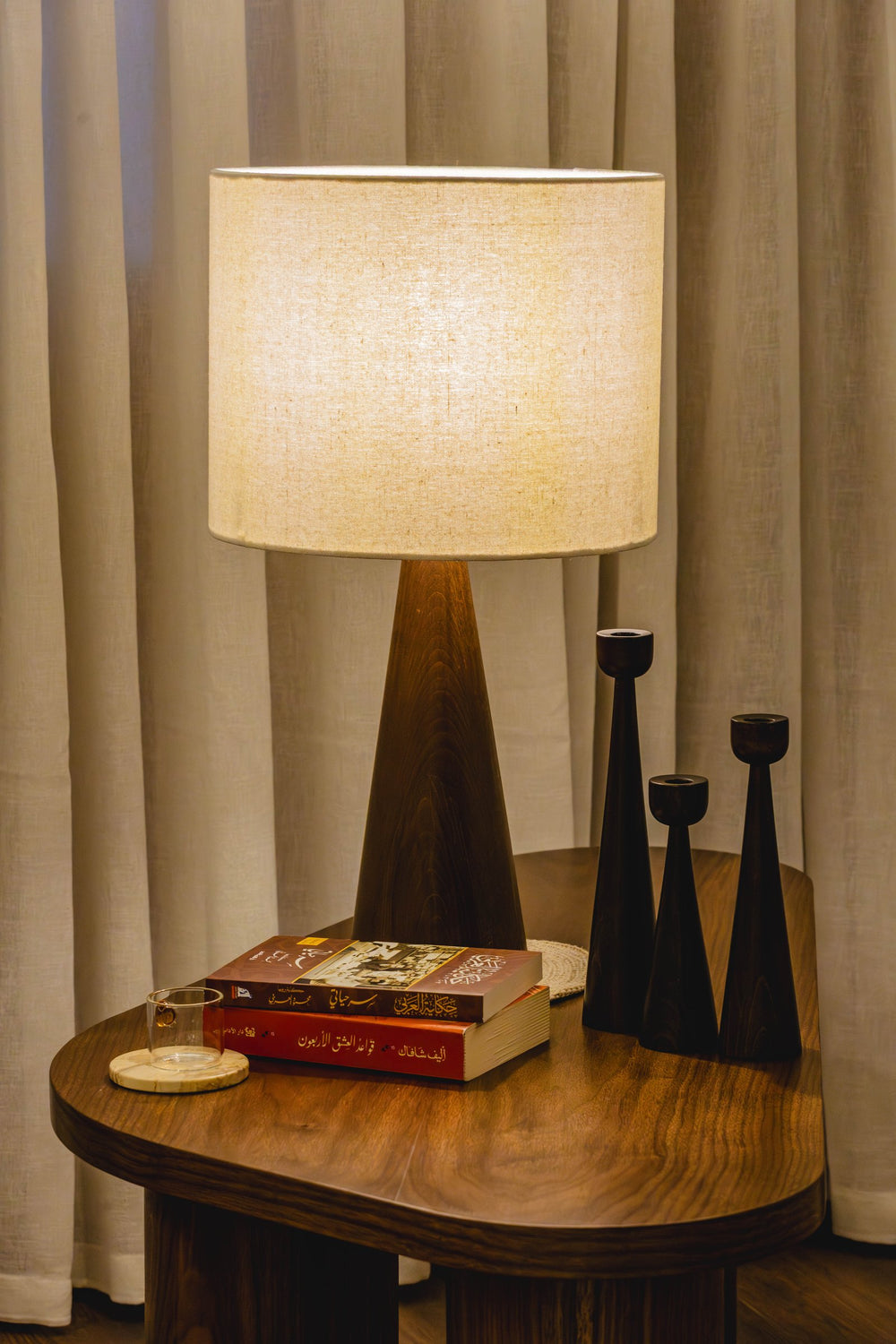 03-real | SOLNE Table Lamp — lit, with the SOLNE Candle Holders