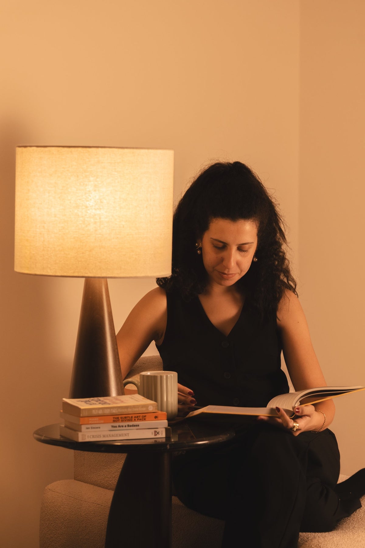 04-room | SOLNE Table Lamp — lighting a reader in an armchair